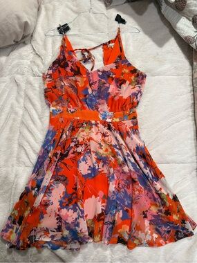 the clothing company Bright Orange Floral-Print Sundress